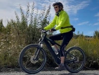 Julie Kitlowski Cycling on the  tour with redspokes